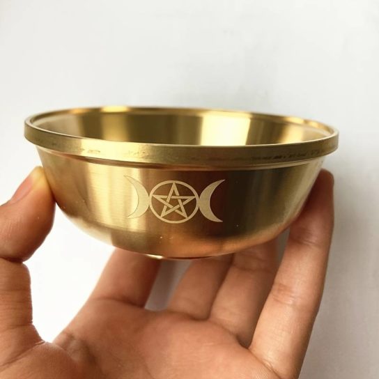 Bol décoratif doré au pentagramme